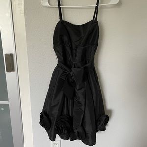 Black homecoming/cocktail dress with large rosettes